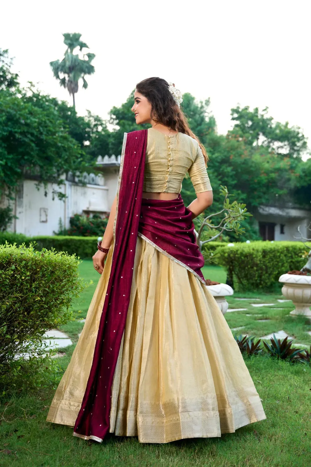 Enchanting  Kanchipuram Zari Weaved Cream Lehenga Choli Set