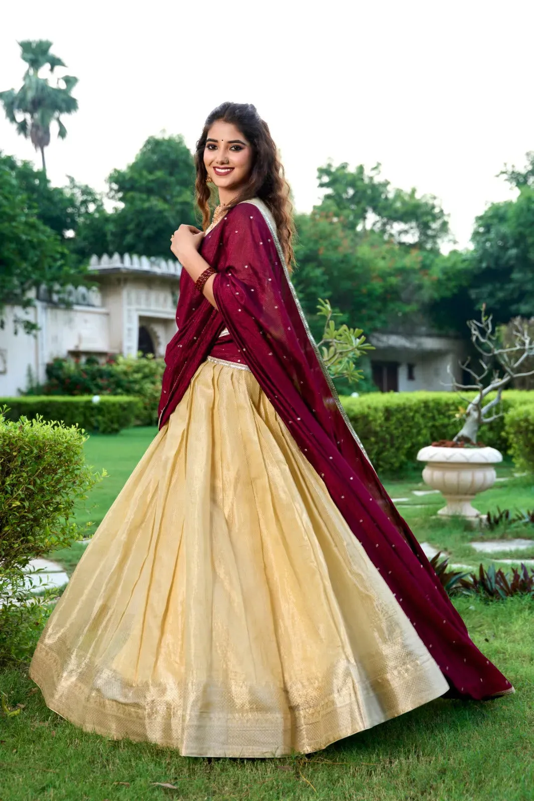 Enchanting  Kanchipuram Zari Weaved Cream Lehenga Choli Set