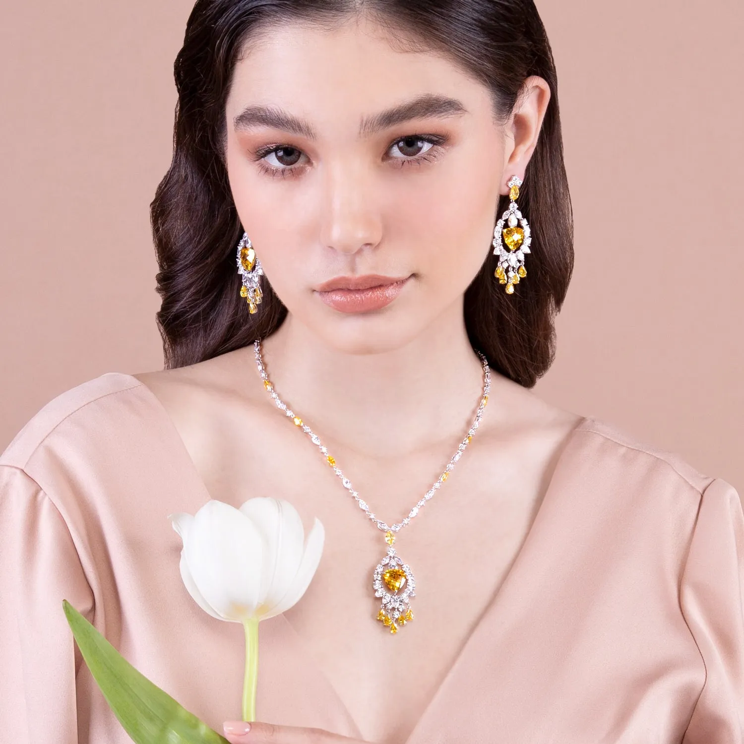 Regalia: Silver rhodium plated 17 2/8" with multi cut yellow and white CZ elegant drop chandelier necklace