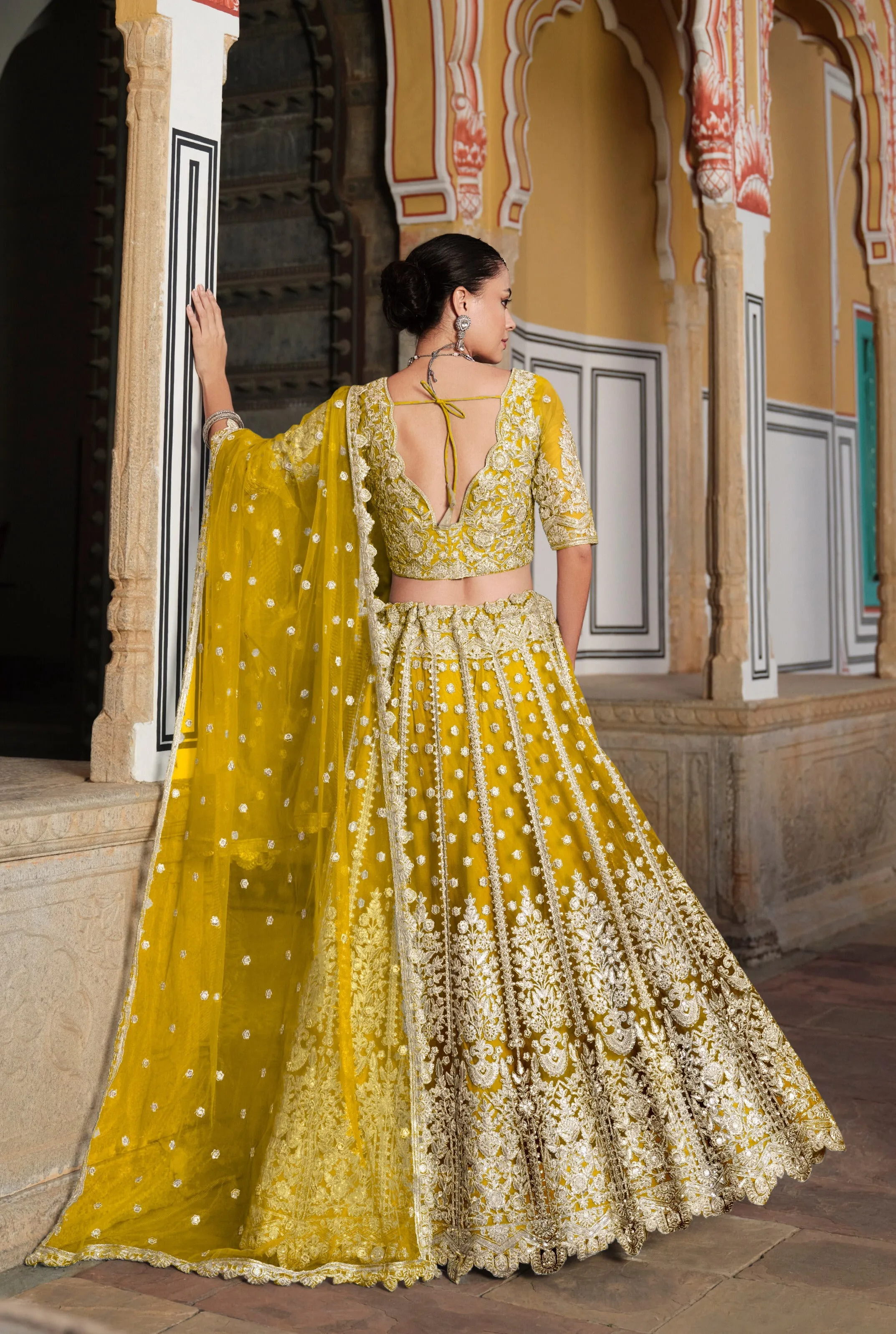 Yellow Embroidered Net Bridal Lehenga Choli
